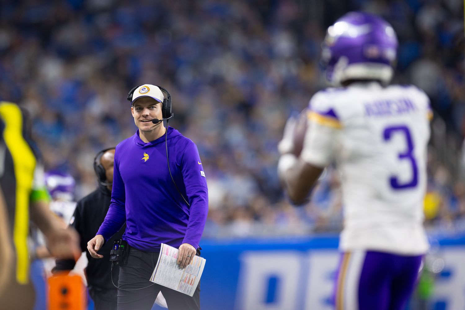 Minnesota Vikings head coach Kevin O'Connell, with wide receiver Jordan Addison in the foreground.